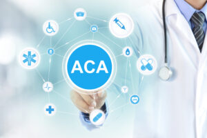 Doctor hand touching ACA (or AFFORDABLE CARE ACT) sign on virtual screen